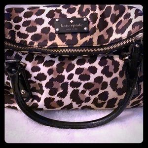 Kate spade cheetah print satchel with strap.
